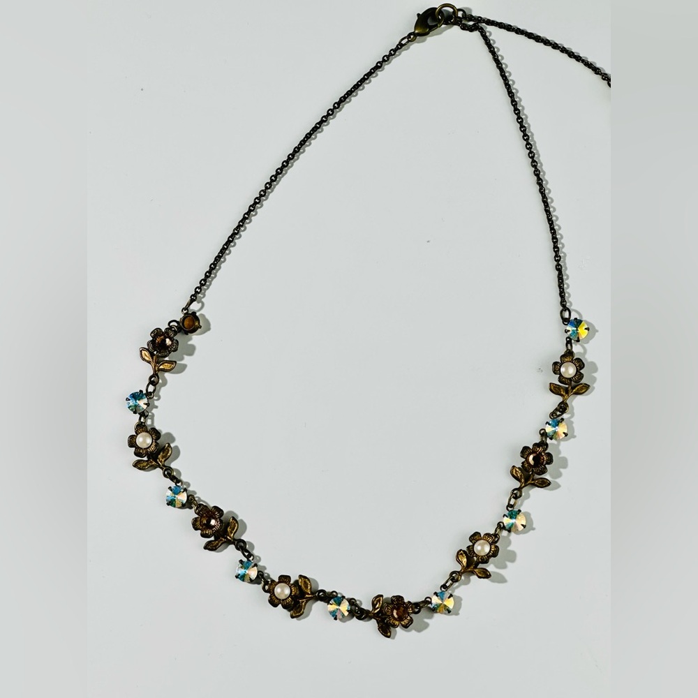 Flower necklace Michael Negrin. Beautiful brass and iridescent stones and pearl